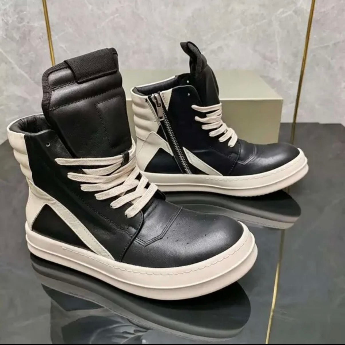 This is a Rick Owens GeoBasket sneaker - Leather Black